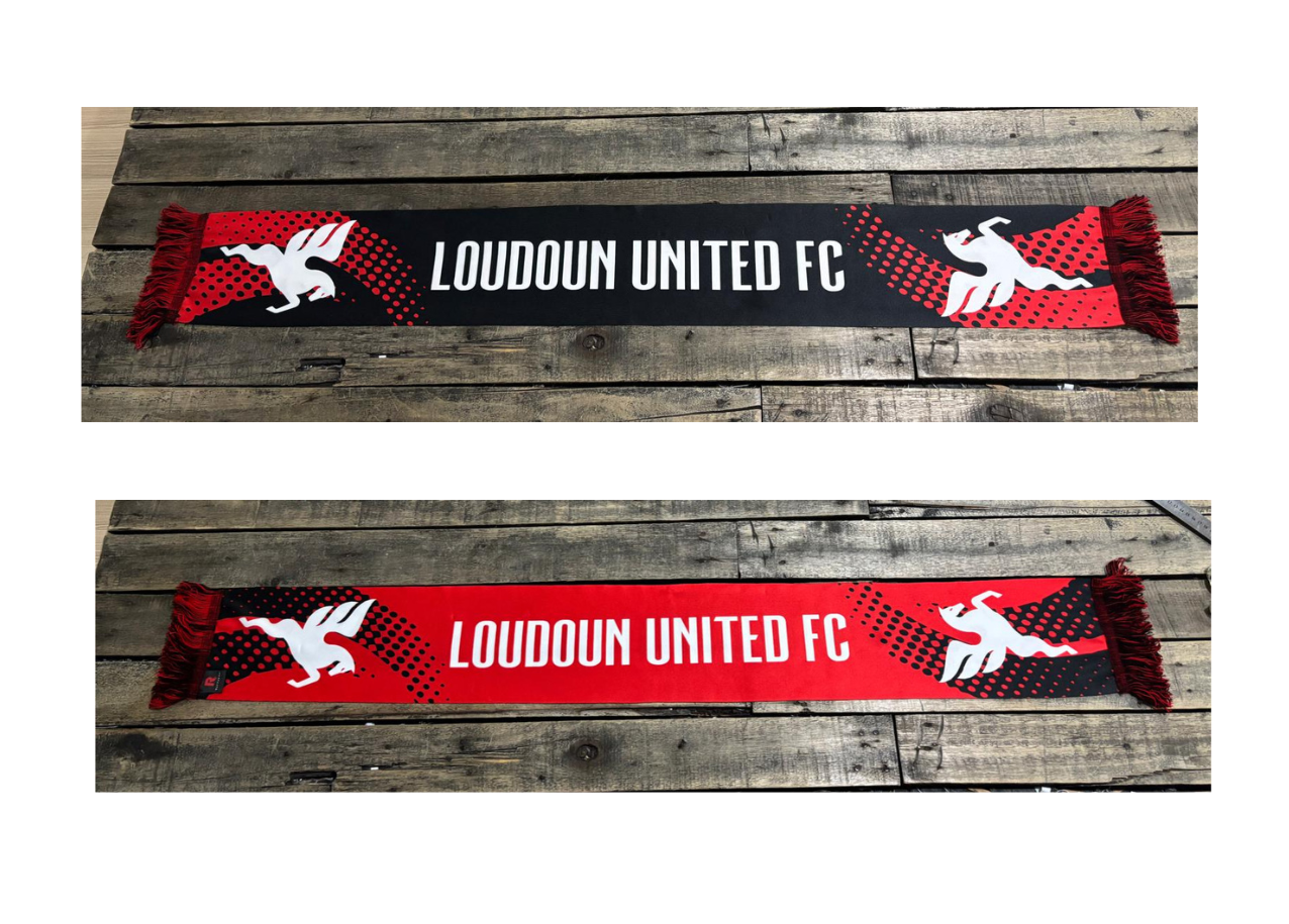 Two Loudoun United FC scarves on a wooden surface