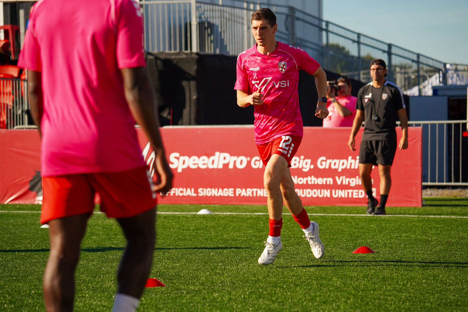 PRE-ORDER - 2025 Breast Cancer Awareness Pink Warm Up Top